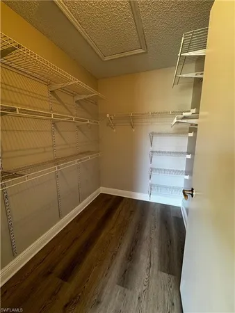 a view of a room with racks on the wall