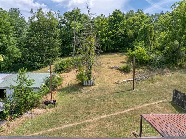 a patio with a table and chairs