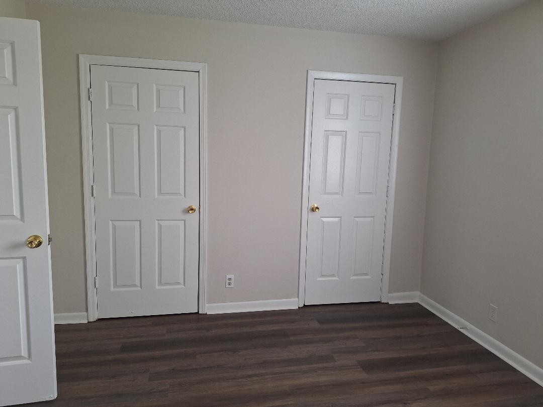 1005 Forest Ridge Court Hermitage, TN 37076 - Photo 9 of 9 a view of an empty room with wooden floor