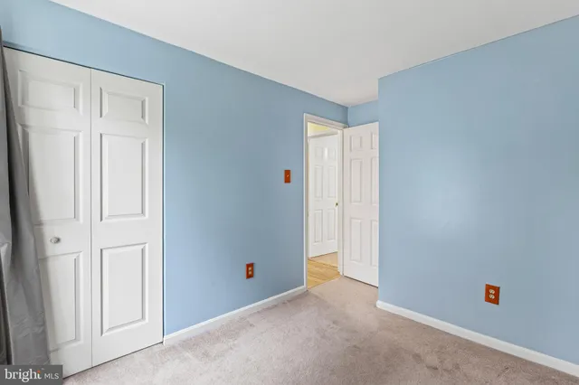an empty room with closet