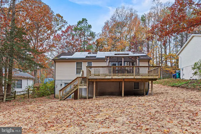 a view of a house with a roof deck