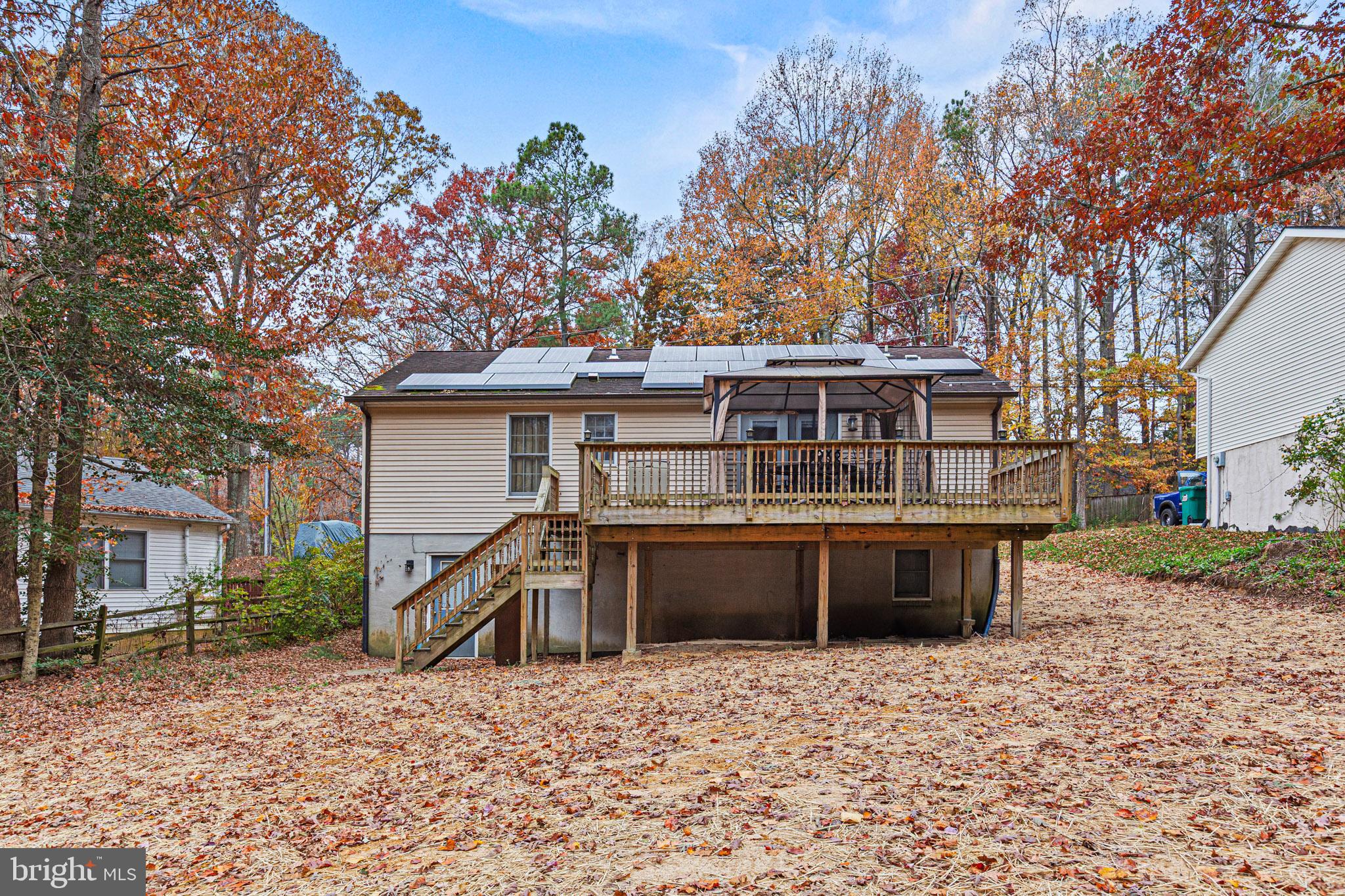 11660 Big Sandy Run Road Lusby, MD 20657 - Photo 28 of 30 a view of a house with a roof deck