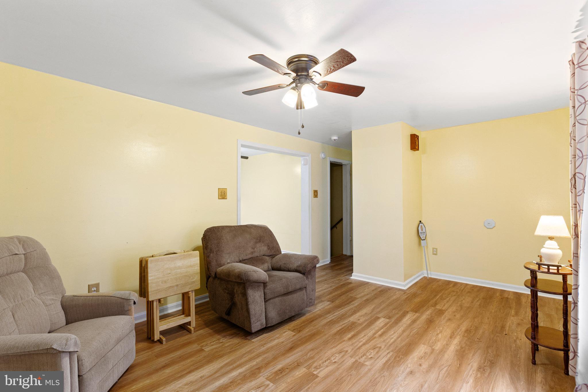 11660 Big Sandy Run Road Lusby, MD 20657 - Photo 4 of 30 a living room with furniture and a wooden floor