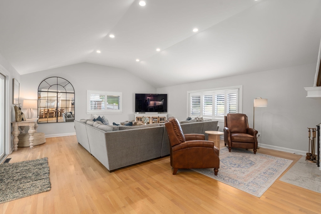 4 Highgate Road Wayland, MA 01778 - Photo 8 of 30 a living room with furniture and a flat screen tv