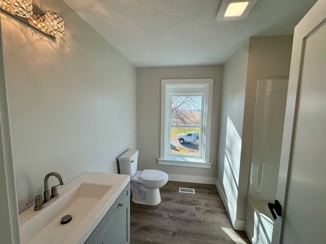 a front view of a house with a porch