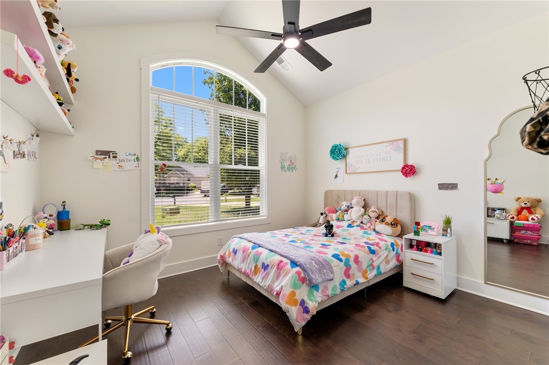 502 Canebrake Drive Anderson, SC 29621 - Photo 28 of 39 This spacious bedroom features a beautiful arched window and rich hardwood flooring.