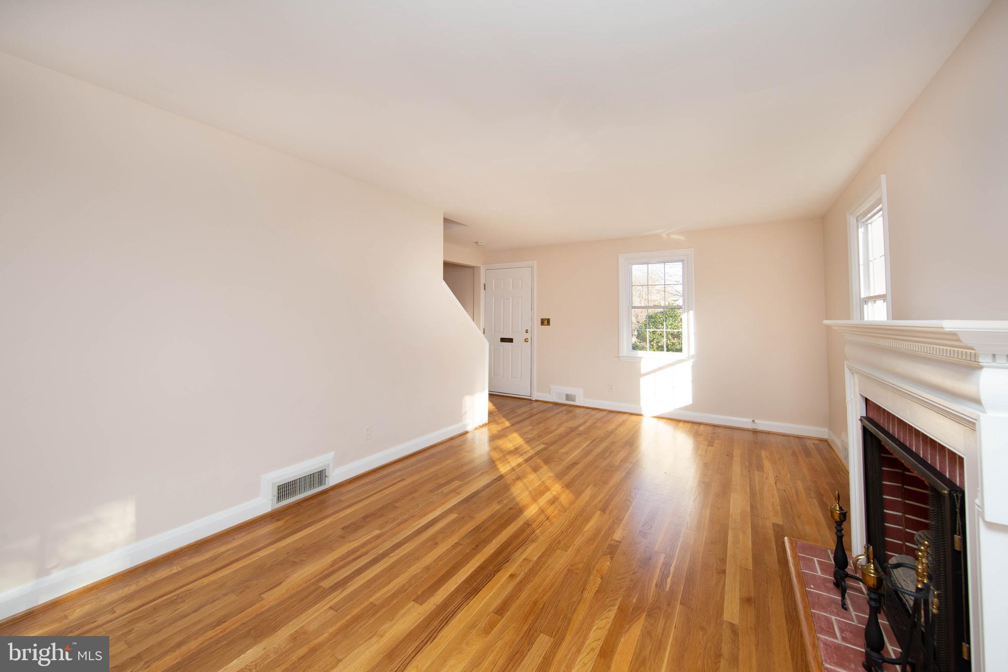 6502 Beechwood Road Baltimore, MD 21239 - Photo 11 of 30 Living Room with Newly Refinished Wood Floors