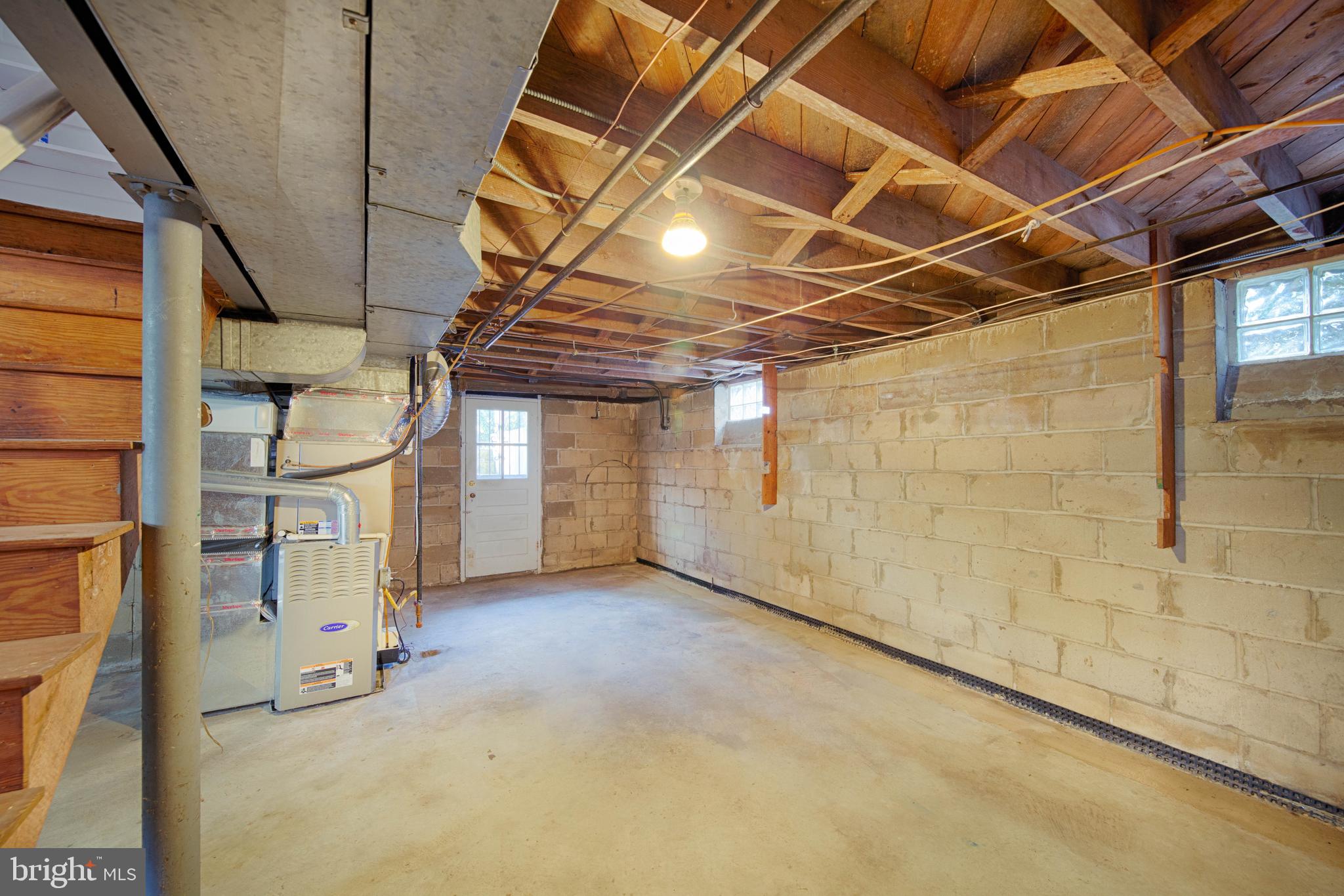 6502 Beechwood Road Baltimore, MD 21239 - Photo 26 of 30 Basement with Loads of Storage Space
