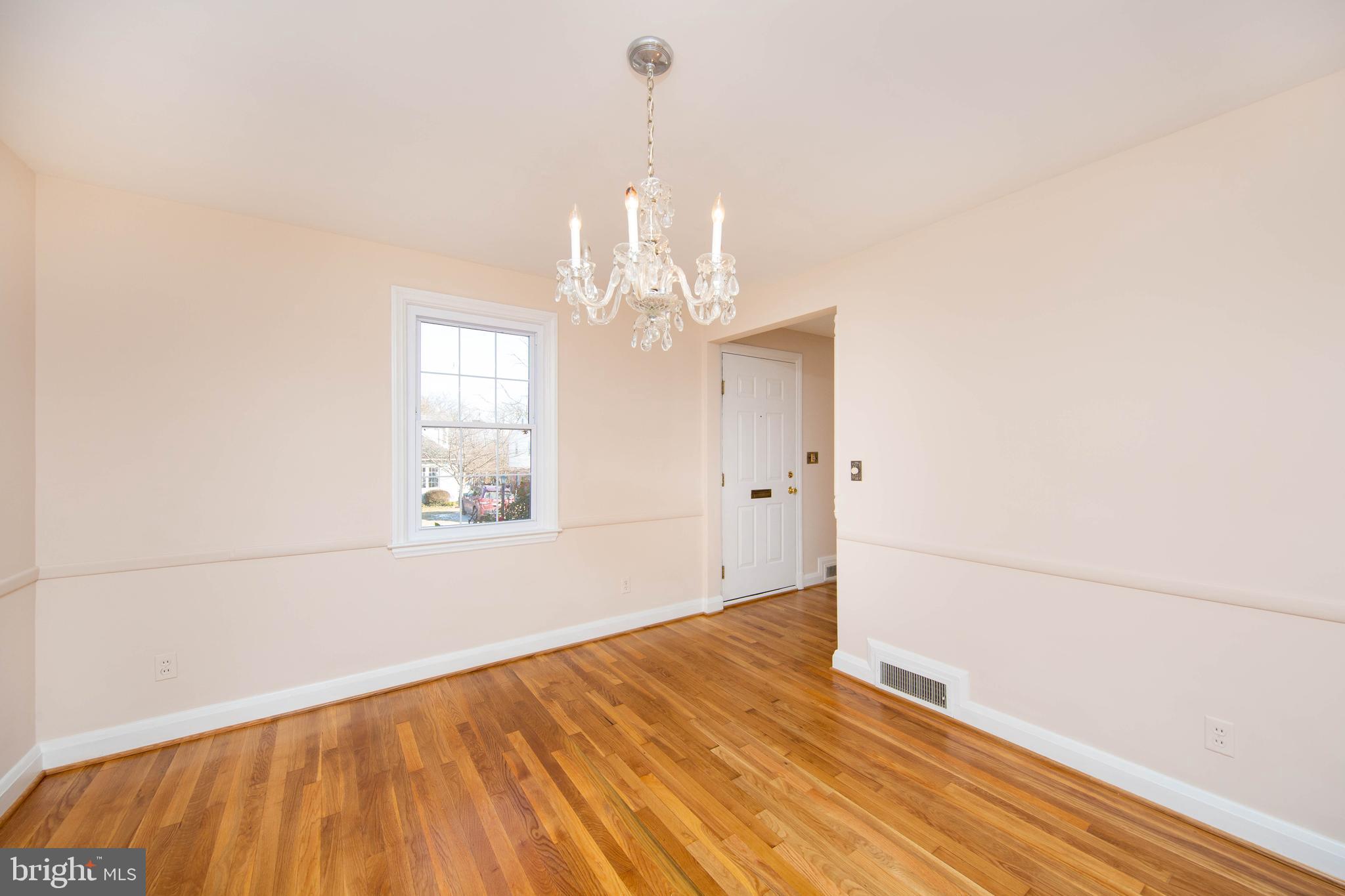 6502 Beechwood Road Baltimore, MD 21239 - Photo 7 of 30 Dining Room with Newly Refinished Wood Floors