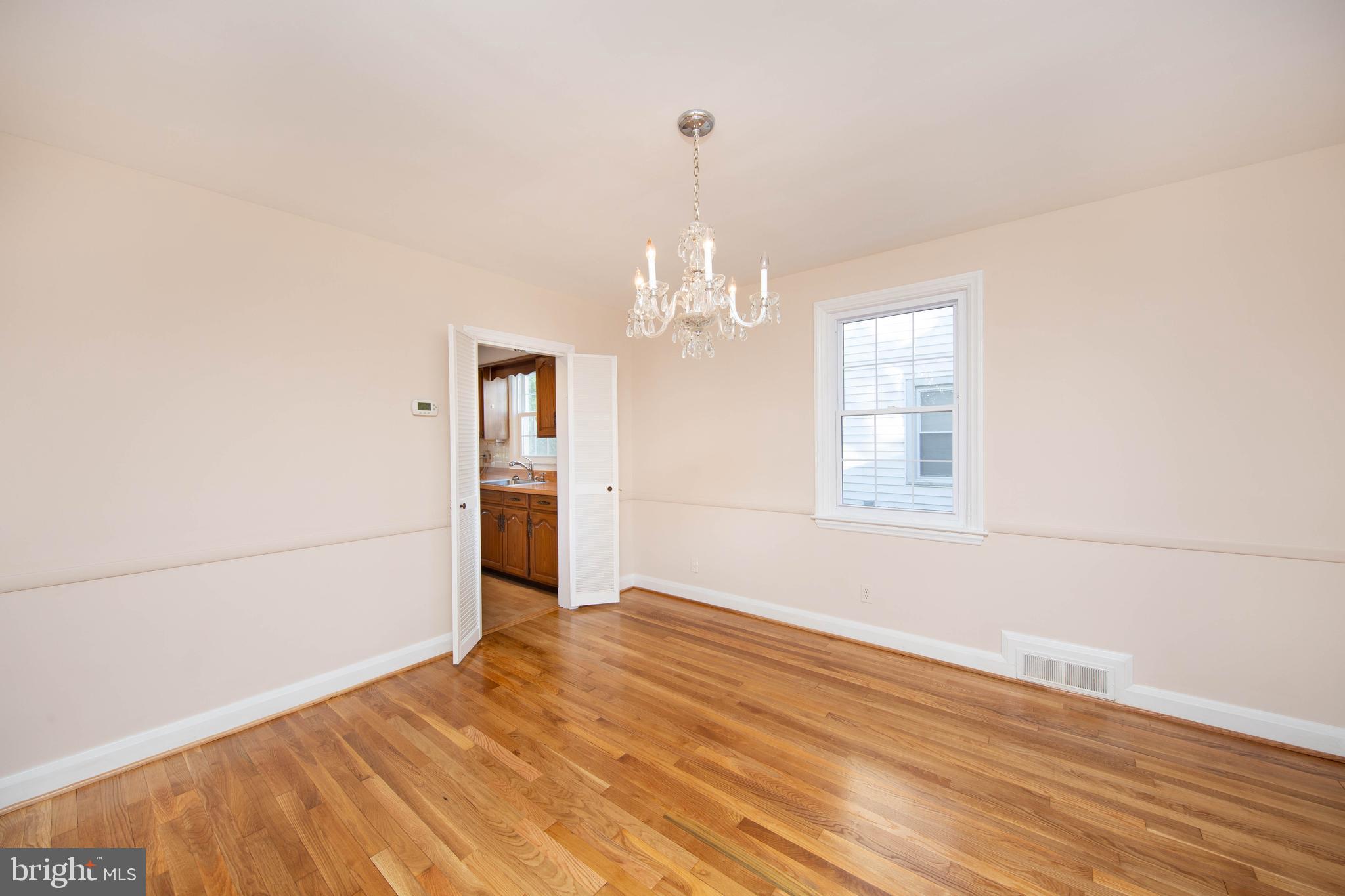 6502 Beechwood Road Baltimore, MD 21239 - Photo 8 of 30 Dining Room to Kitchen