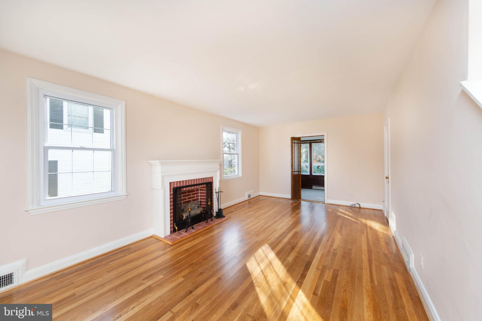 6502 Beechwood Road Baltimore, MD 21239 - Photo 10 of 30 Living Room with Entry to Sun Room with Heat