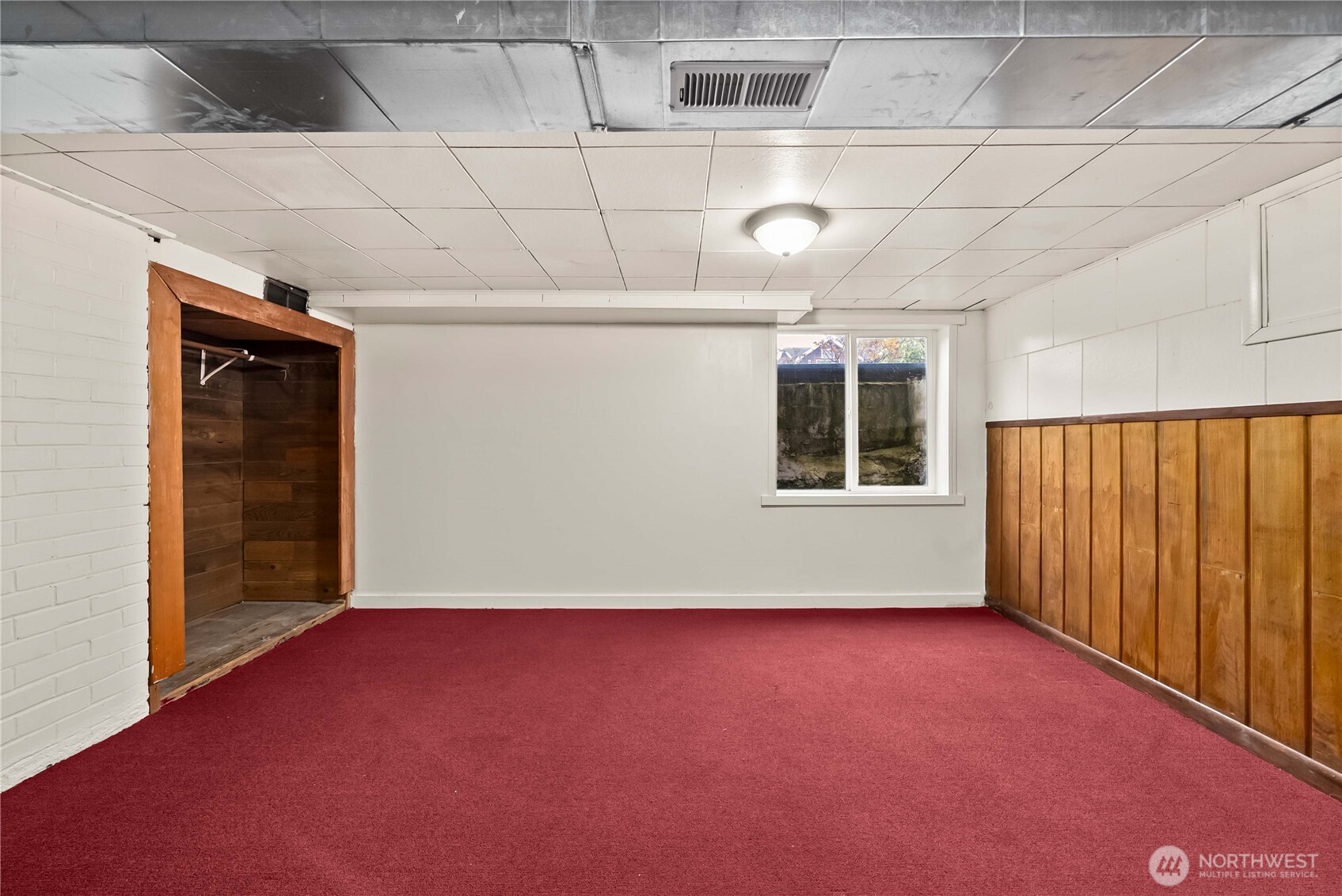 9717 14th Avenue Northwest Seattle, WA 98117 - Photo 19 of 32 a view of a room with windows