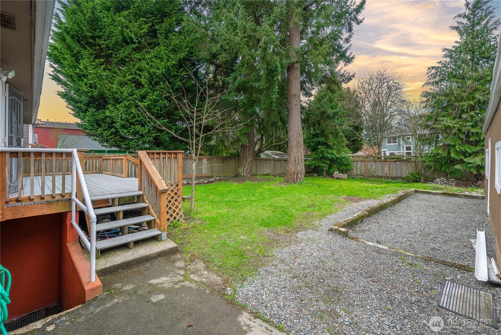 9717 14th Avenue Northwest Seattle, WA 98117 - Photo 24 of 32 a view of a deck with a yard