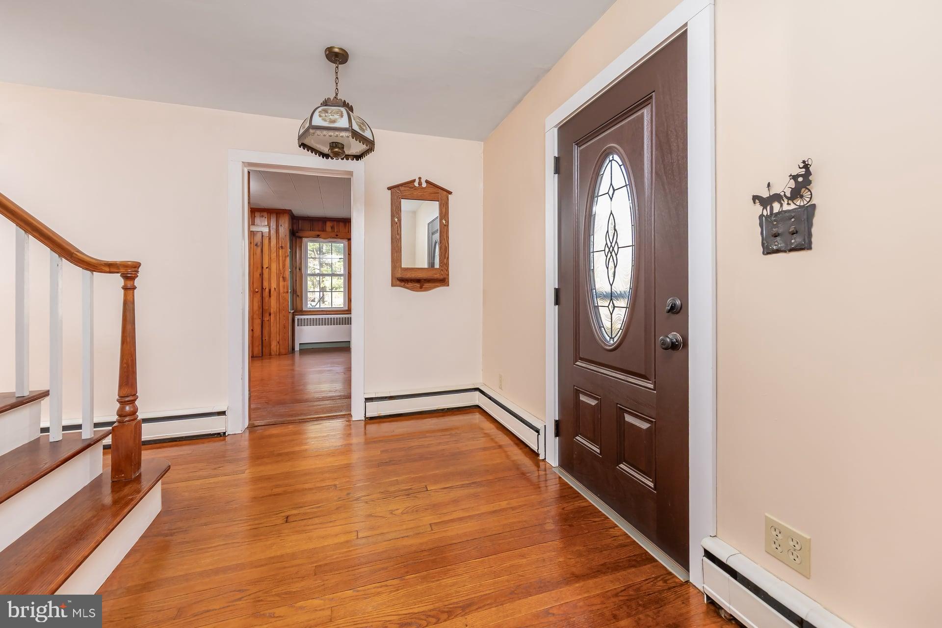 97 Alloway Aldine Road Alloway, NJ 08098 - Photo 8 of 52 Inviting entryway with warm wooden accents.
