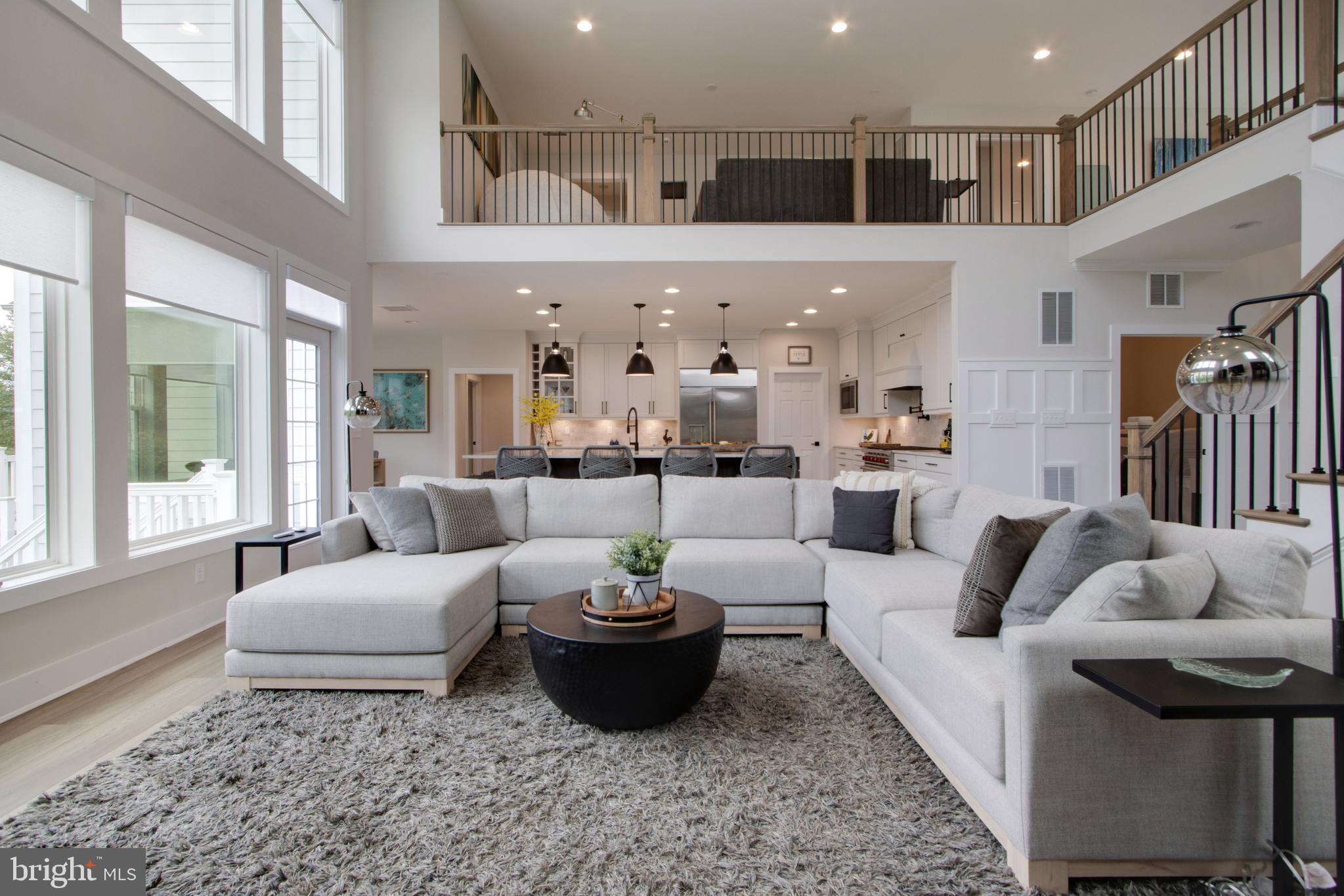 16672 New Road Lewes, DE 19958 - Photo 13 of 55 a living room with furniture and a potted plant