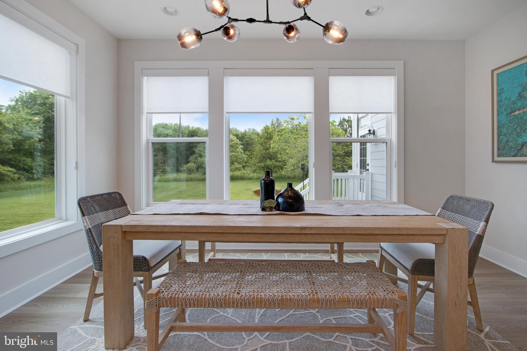 16672 New Road Lewes, DE 19958 - Photo 25 of 55 a dining room with furniture and window