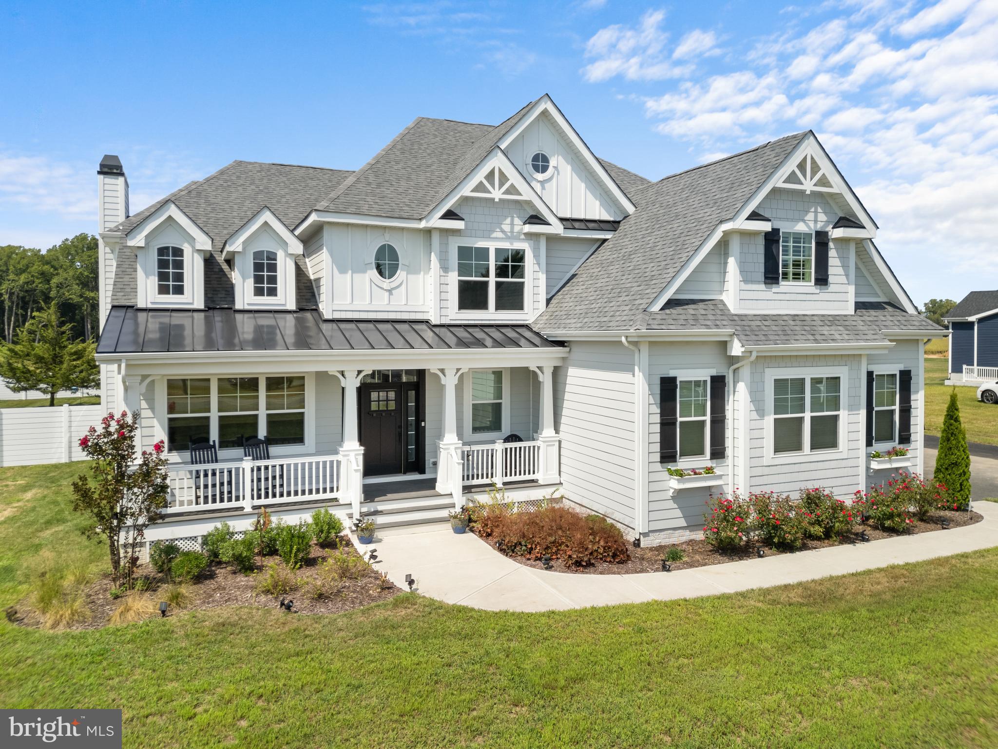 16672 New Road Lewes, DE 19958 - Photo 3 of 55 front view of a house with a yard