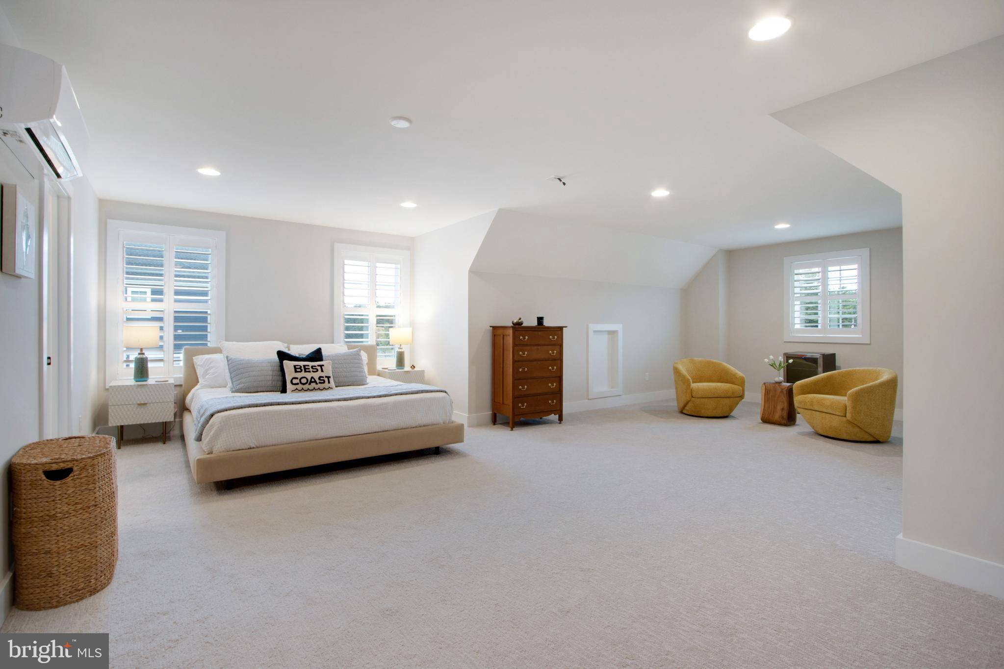 16672 New Road Lewes, DE 19958 - Photo 37 of 55 a spacious bedroom with bed and a couch