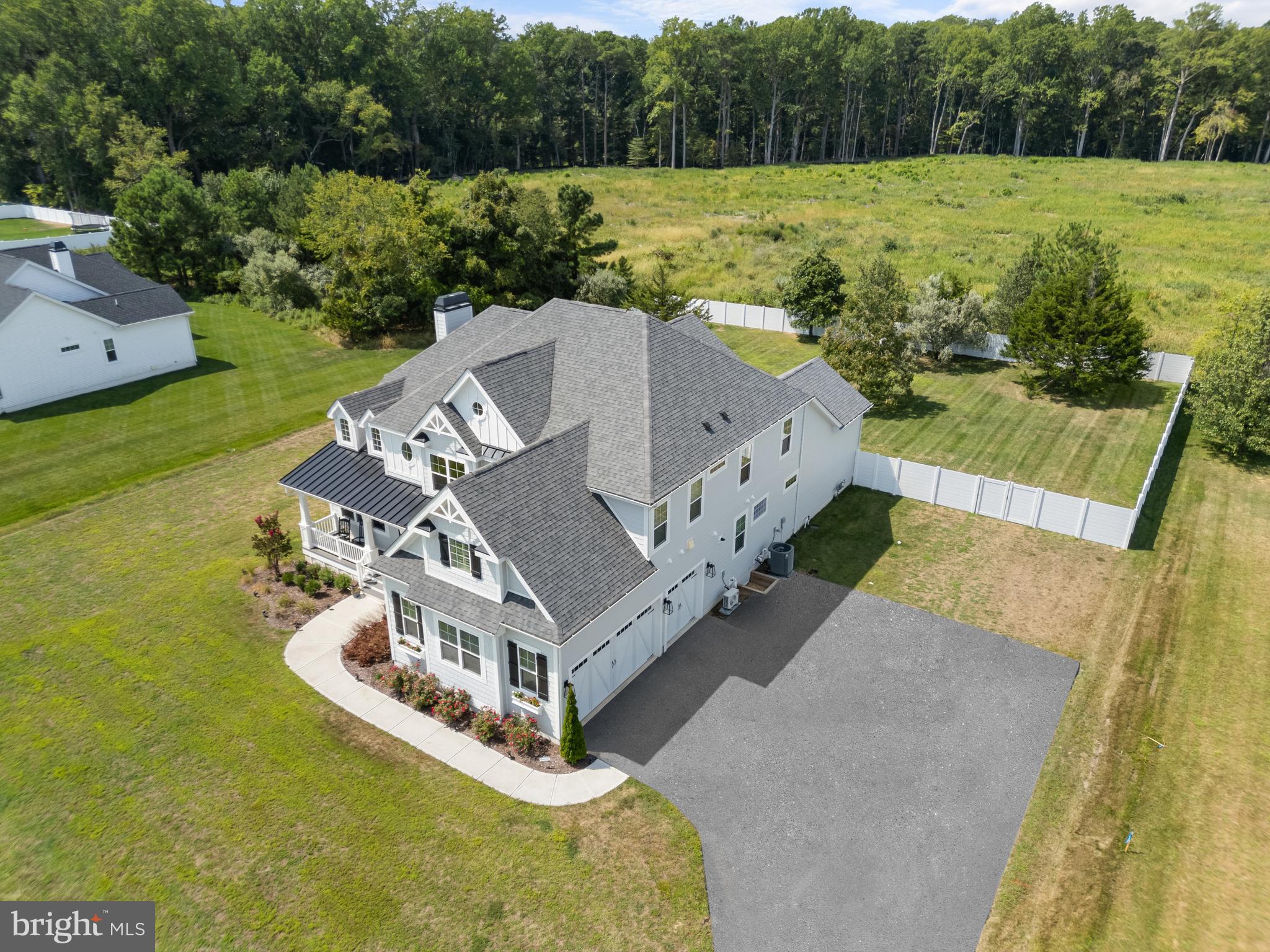 16672 New Road Lewes, DE 19958 - Photo 5 of 55 a view of a house with a yard