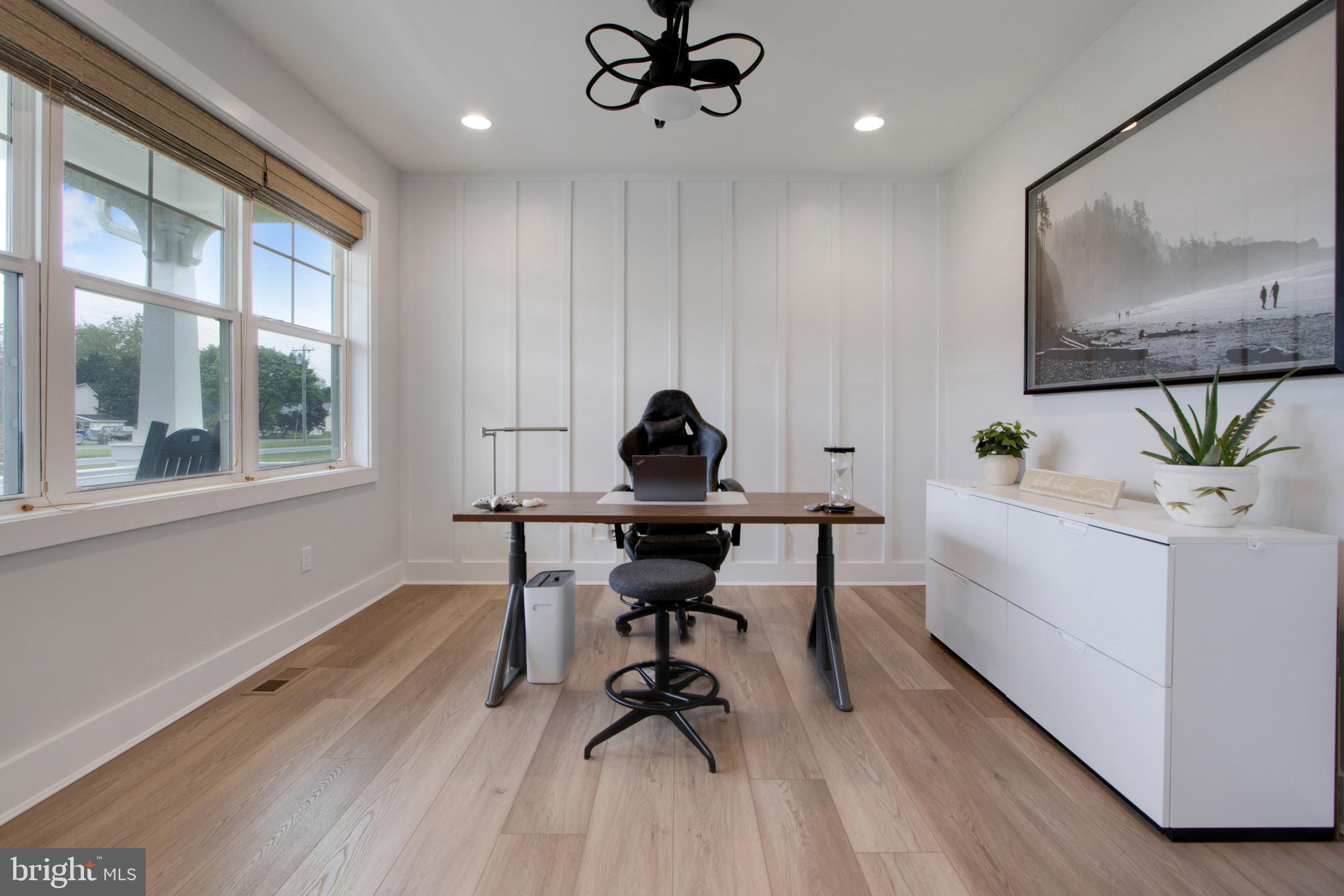 16672 New Road Lewes, DE 19958 - Photo 8 of 55 a living room with furniture and a window