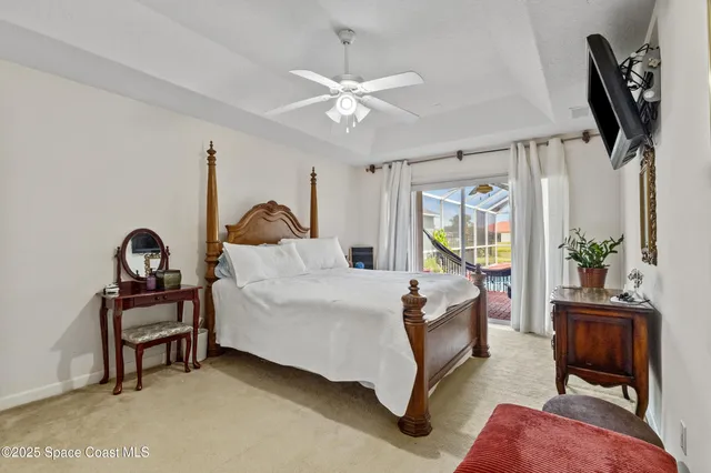 a view of a livingroom with furniture and windows