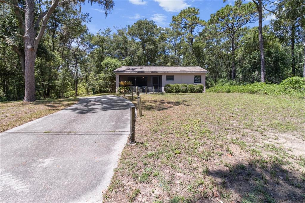 721 Windy Avenue Inverness, FL 34452 - Photo 1 of 1 a view of a house with a yard