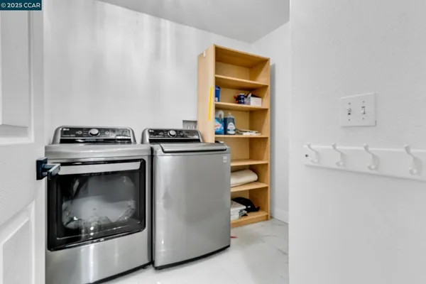 a kitchen with a stove and a microwave
