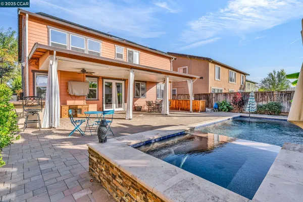 front view of a building with sitting area