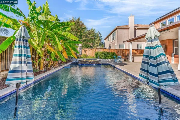 a view of a house with swimming pool