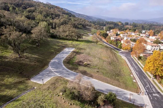 an aerial view of residential house and outdoor space