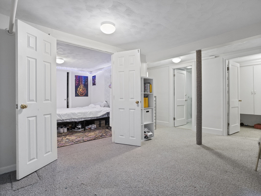 29 Payson Road Brookline, MA 02467 - Photo 14 of 28 a view of a livingroom with furniture