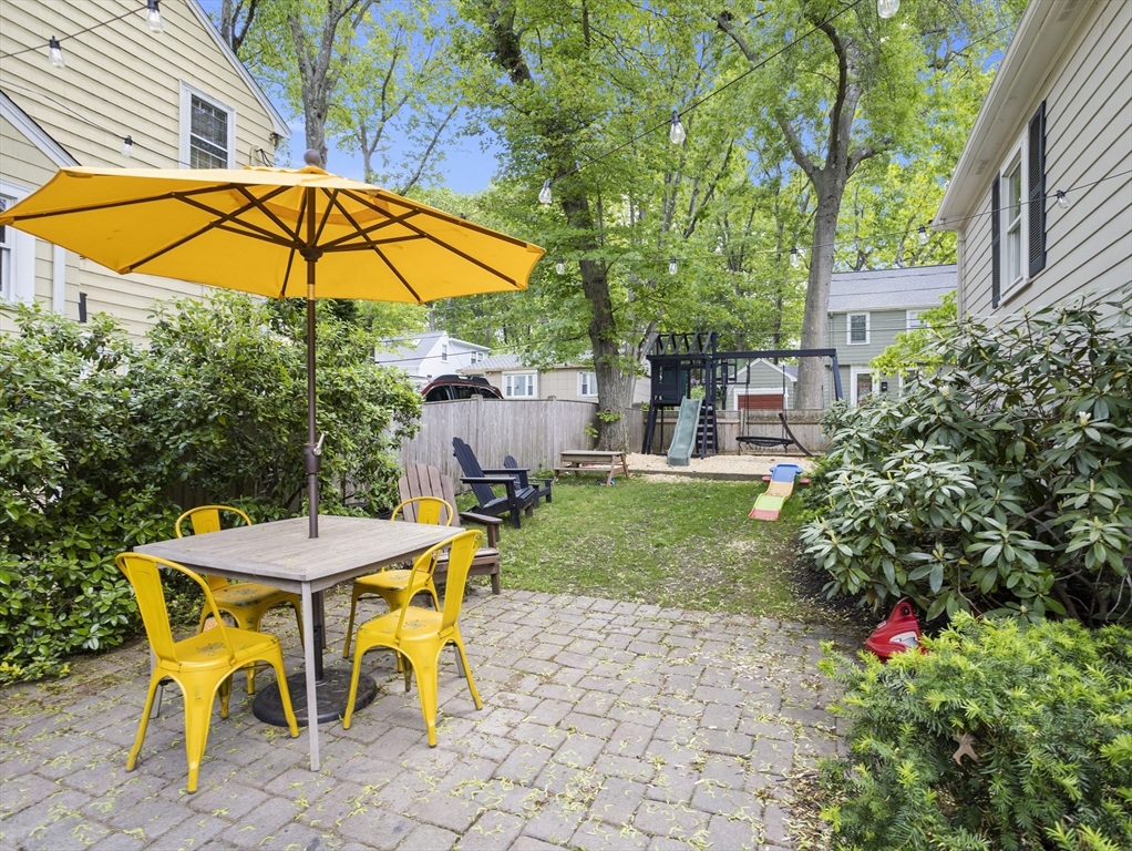 29 Payson Road Brookline, MA 02467 - Photo 18 of 28 a view of a swimming pool with a patio