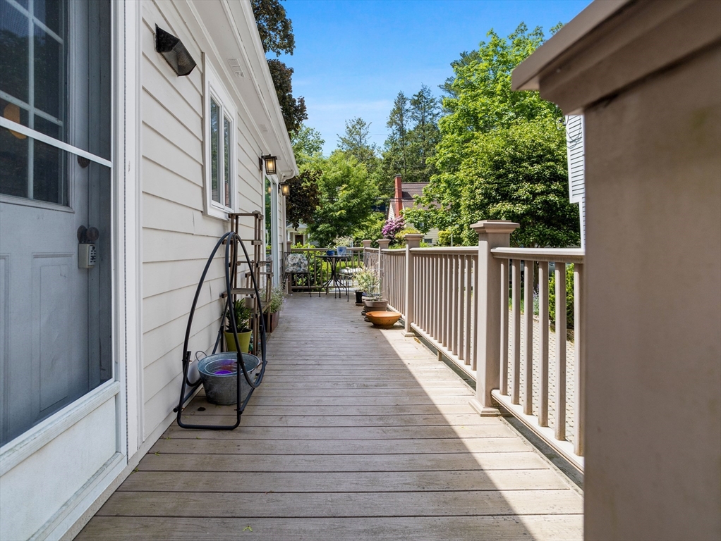 29 Payson Road Brookline, MA 02467 - Photo 23 of 28 a view of balcony with wooden floor and stairs