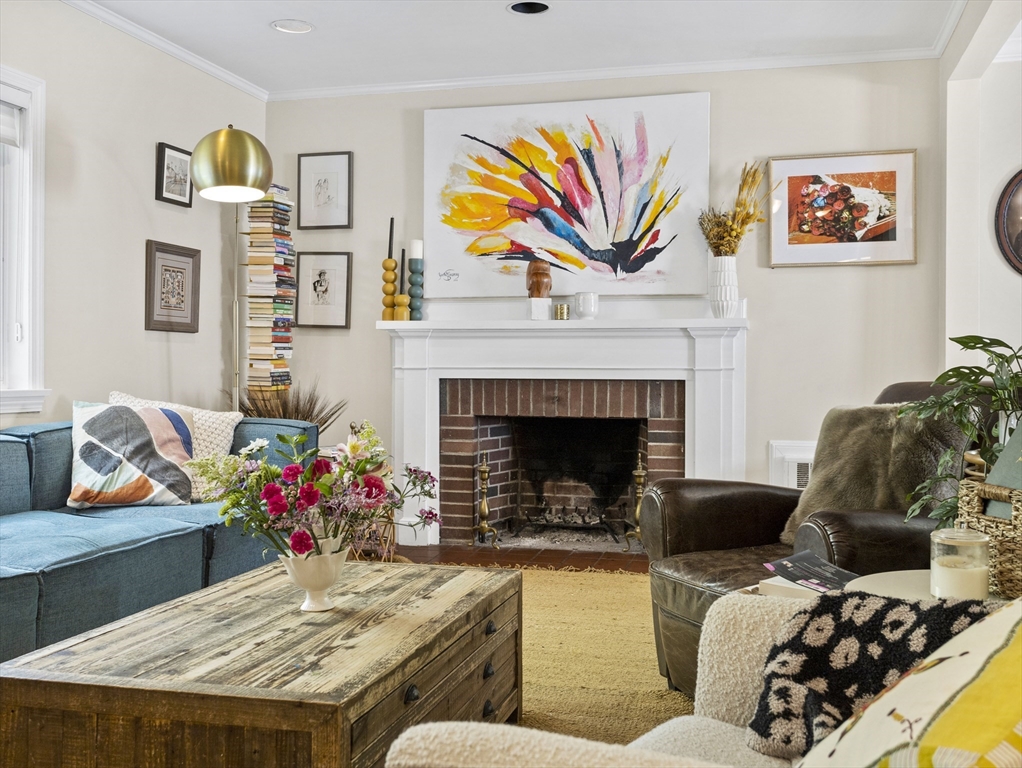 29 Payson Road Brookline, MA 02467 - Photo 3 of 28 a living room with furniture and a fireplace