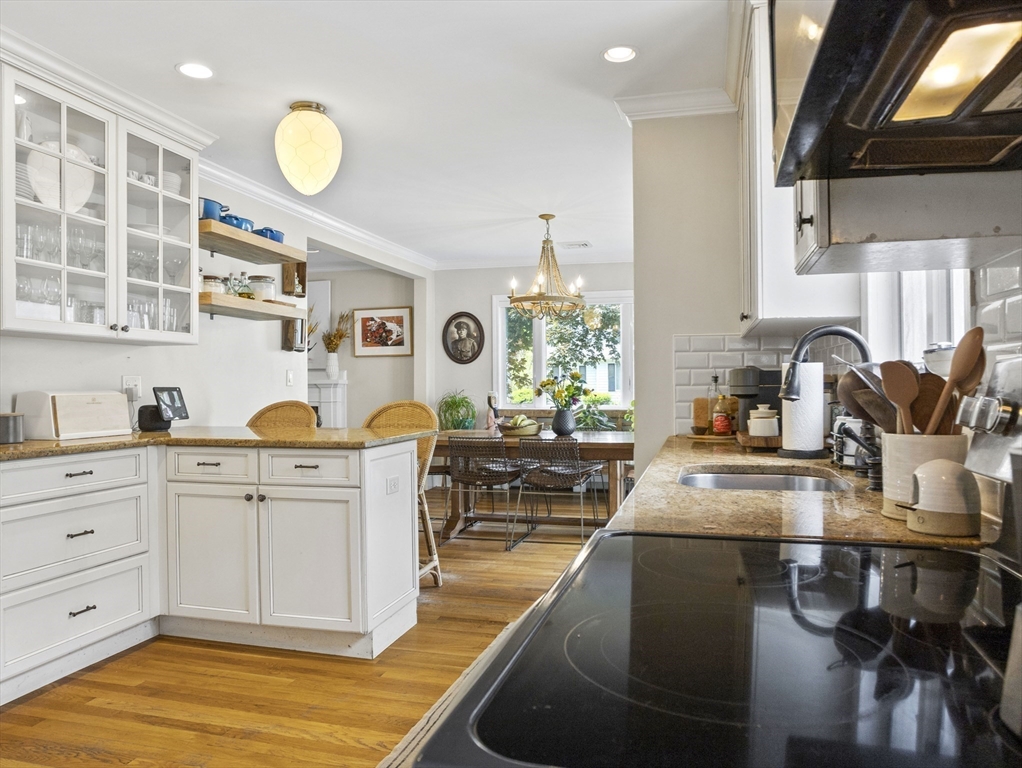 29 Payson Road Brookline, MA 02467 - Photo 8 of 28 a kitchen with cabinets a sink and appliances