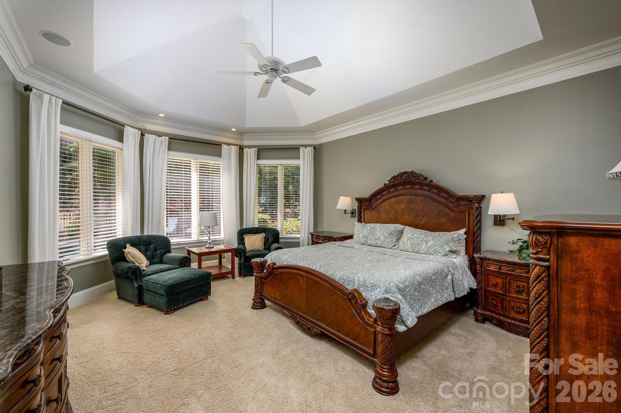 7315 Bay Ridge Drive Denver, NC 28037 - Photo 15 of 39 a bedroom with a bed and glass window