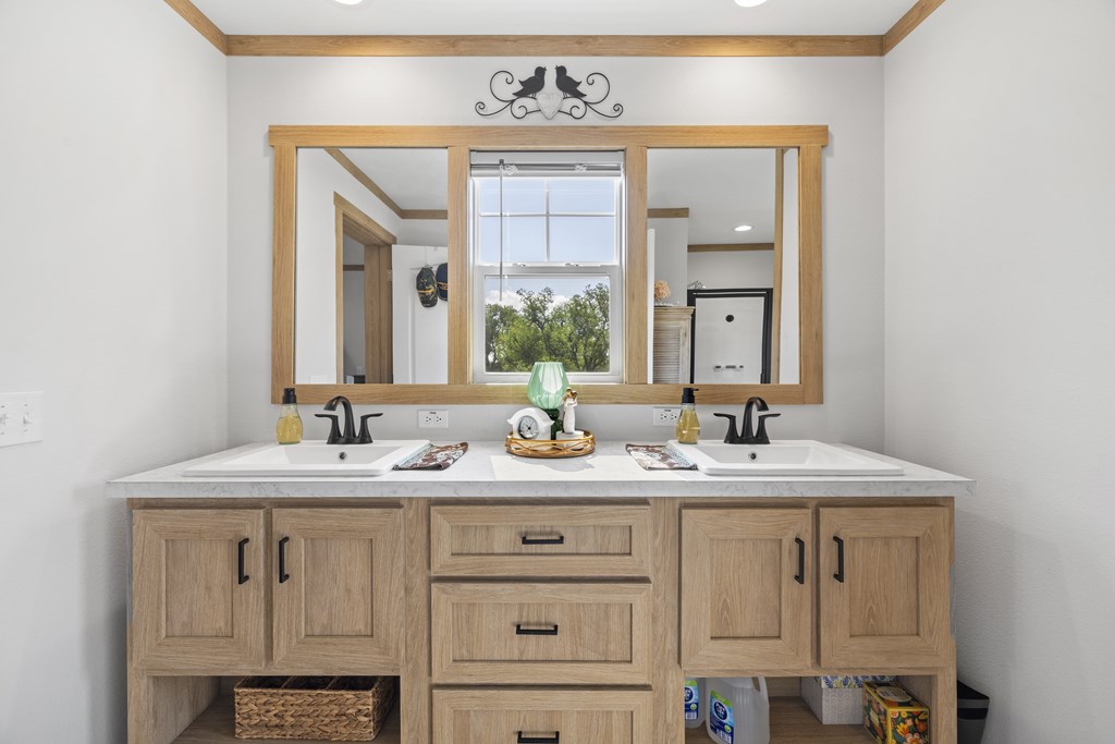 64 Scott Branch Road Harper, TX 78631 - Photo 14 of 36 a bathroom with a sink and a mirror