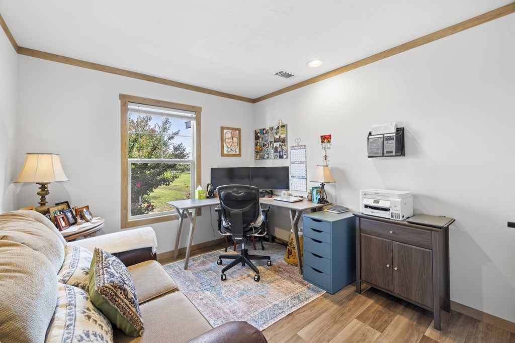 64 Scott Branch Road Harper, TX 78631 - Photo 16 of 36 a view of a workspace with furniture and a window