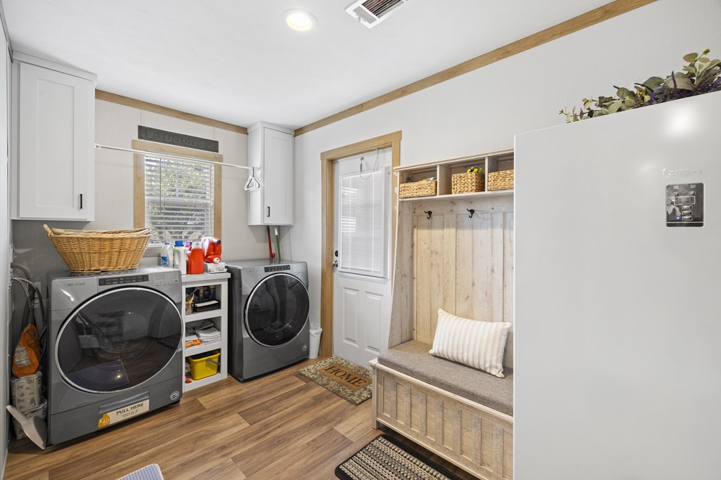 64 Scott Branch Road Harper, TX 78631 - Photo 19 of 36 a view of a bedroom with washer and dryer