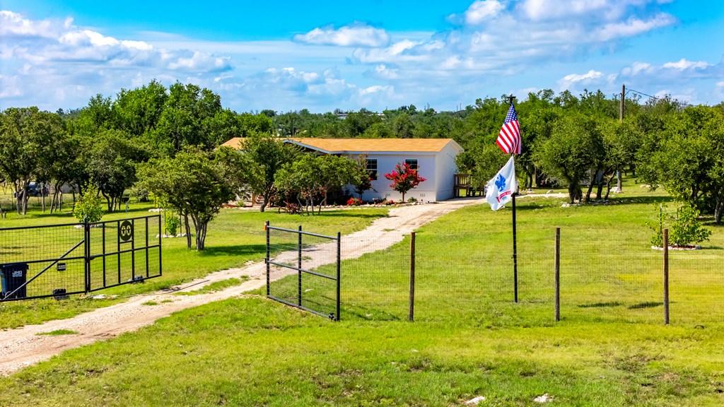 64 Scott Branch Road Harper, TX 78631 - Photo 2 of 36 a view of an outdoor space and yard
