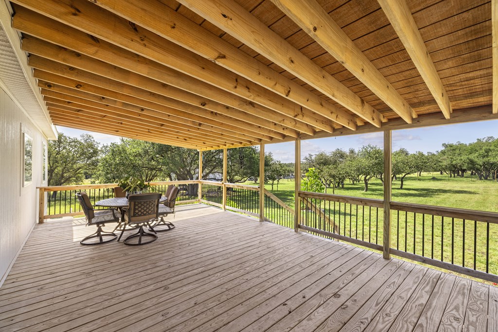 64 Scott Branch Road Harper, TX 78631 - Photo 21 of 36 a view of a swimming pool with a patio