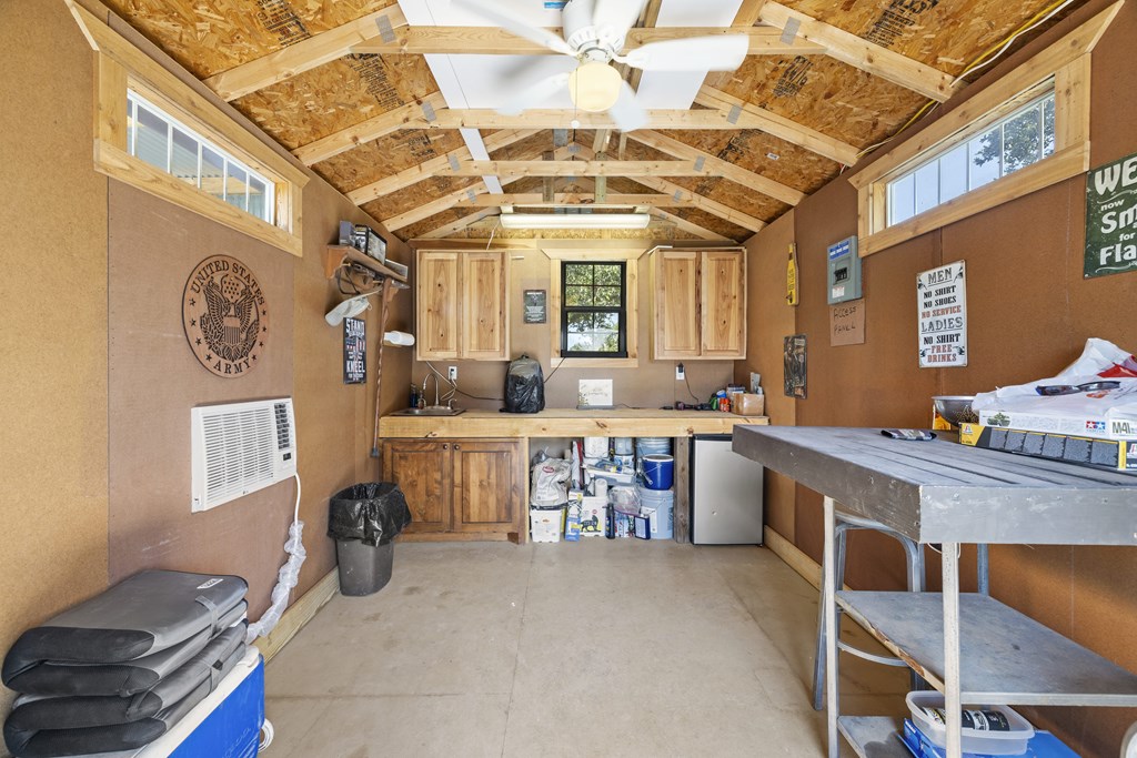64 Scott Branch Road Harper, TX 78631 - Photo 25 of 36 a view of a kitchen with furniture and a window