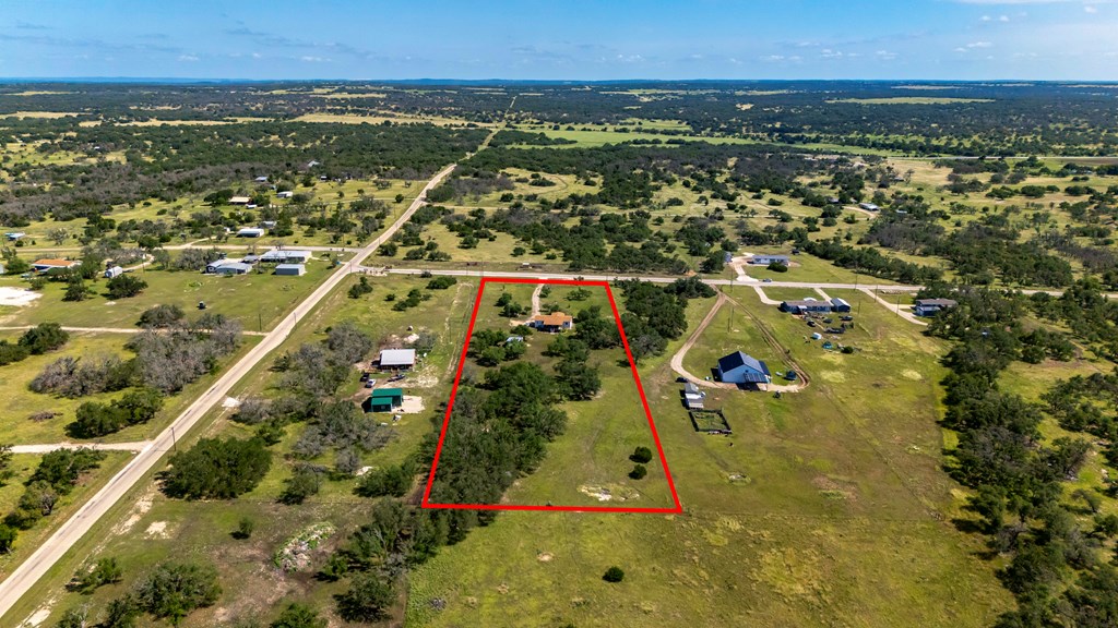 64 Scott Branch Road Harper, TX 78631 - Photo 33 of 36 an aerial view of residential houses with outdoor space