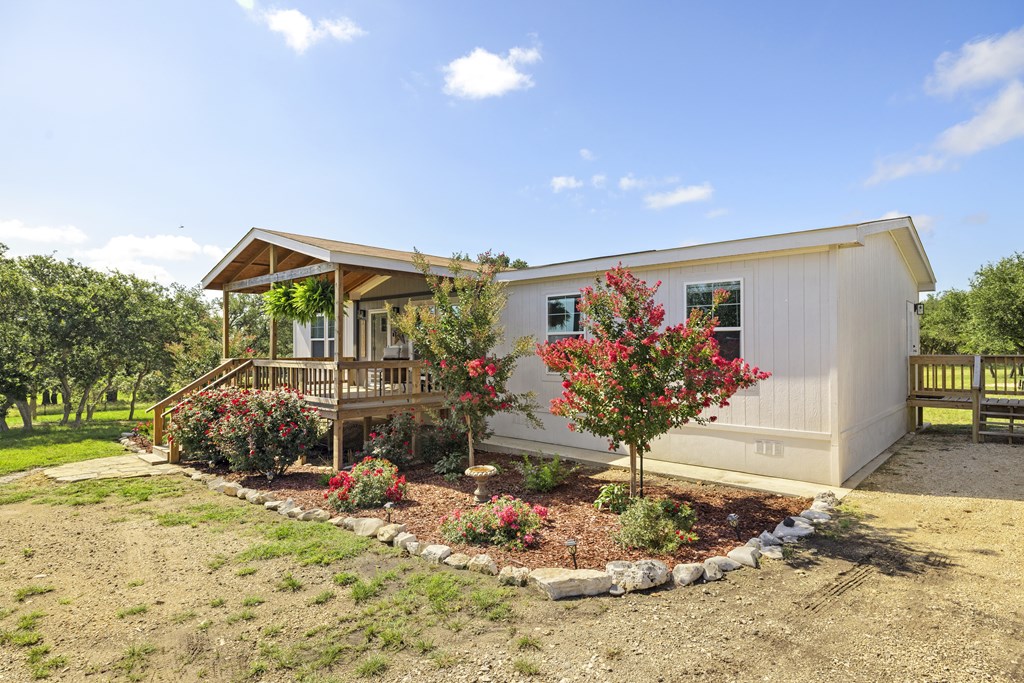 64 Scott Branch Road Harper, TX 78631 - Photo 4 of 36 a front view of a house with yard