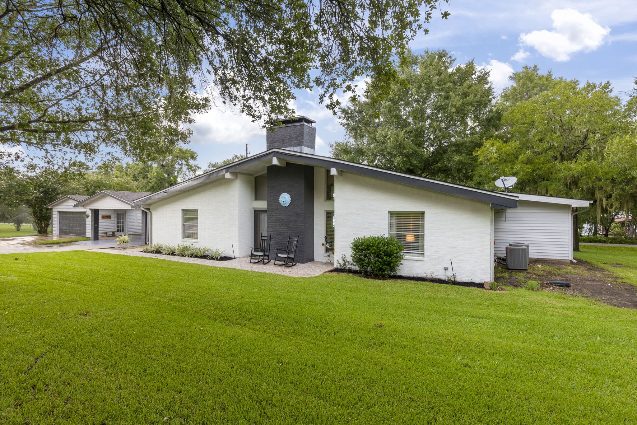 245 Lakeland Road Huntsville, TX 77320 - Photo 3 of 49 Charming 3-bedroom, 3-bathroom home, complete with a bonus bunk room ideal for guests or family fun.
