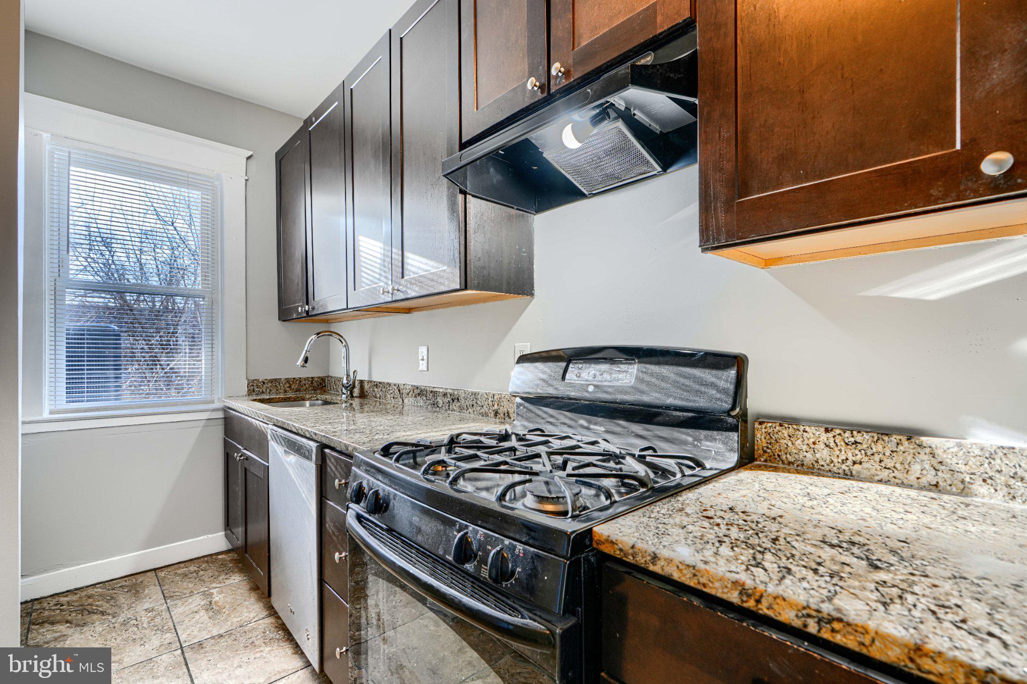 3414 Alto Road, Unit 2 Baltimore, MD 21216 - Photo 6 of 26 Modern kitchen with sleek finishes.