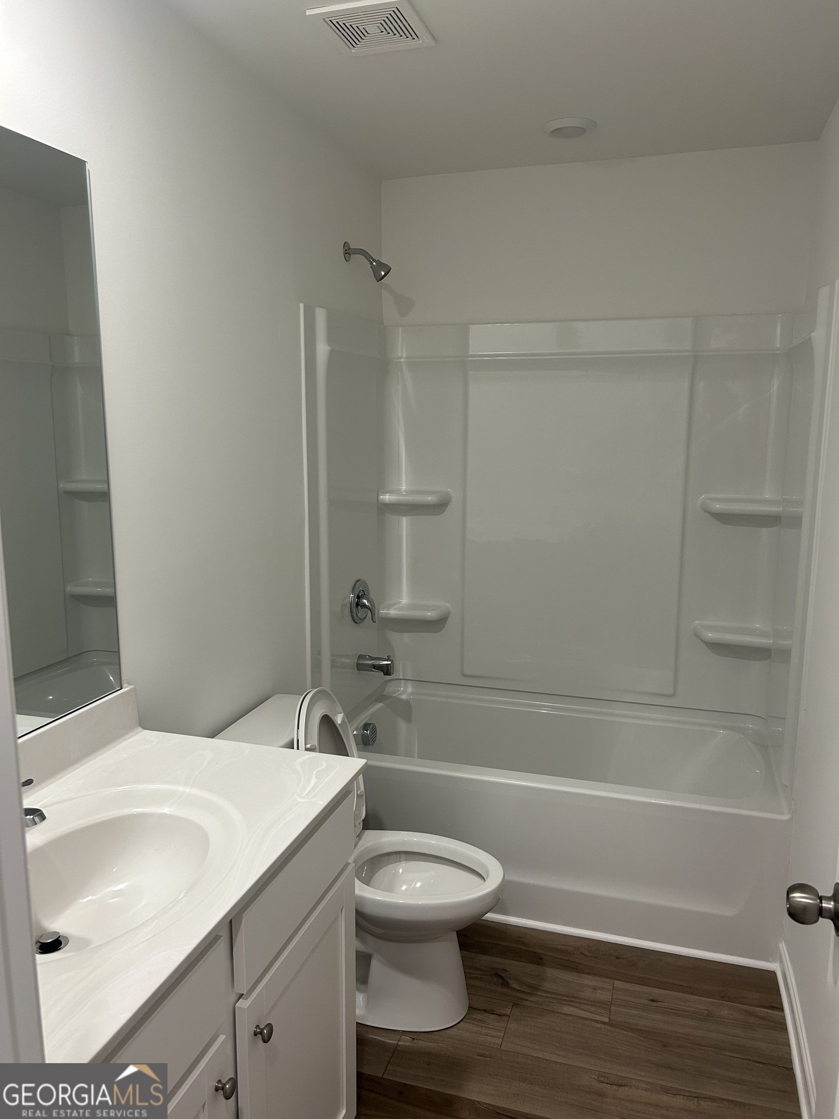 160 Vision Street Bethlehem, GA 30620 - Photo 9 of 11 a bathroom with a sink toilet and shower