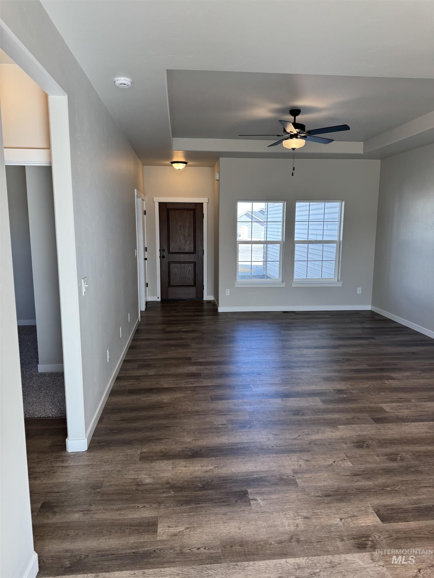 2064 Harrison Street South Twin Falls, ID 83301 - Photo 6 of 29 Foyer with dark wood-style flooring and a ceiling fan