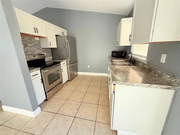 view of an empty room with closet