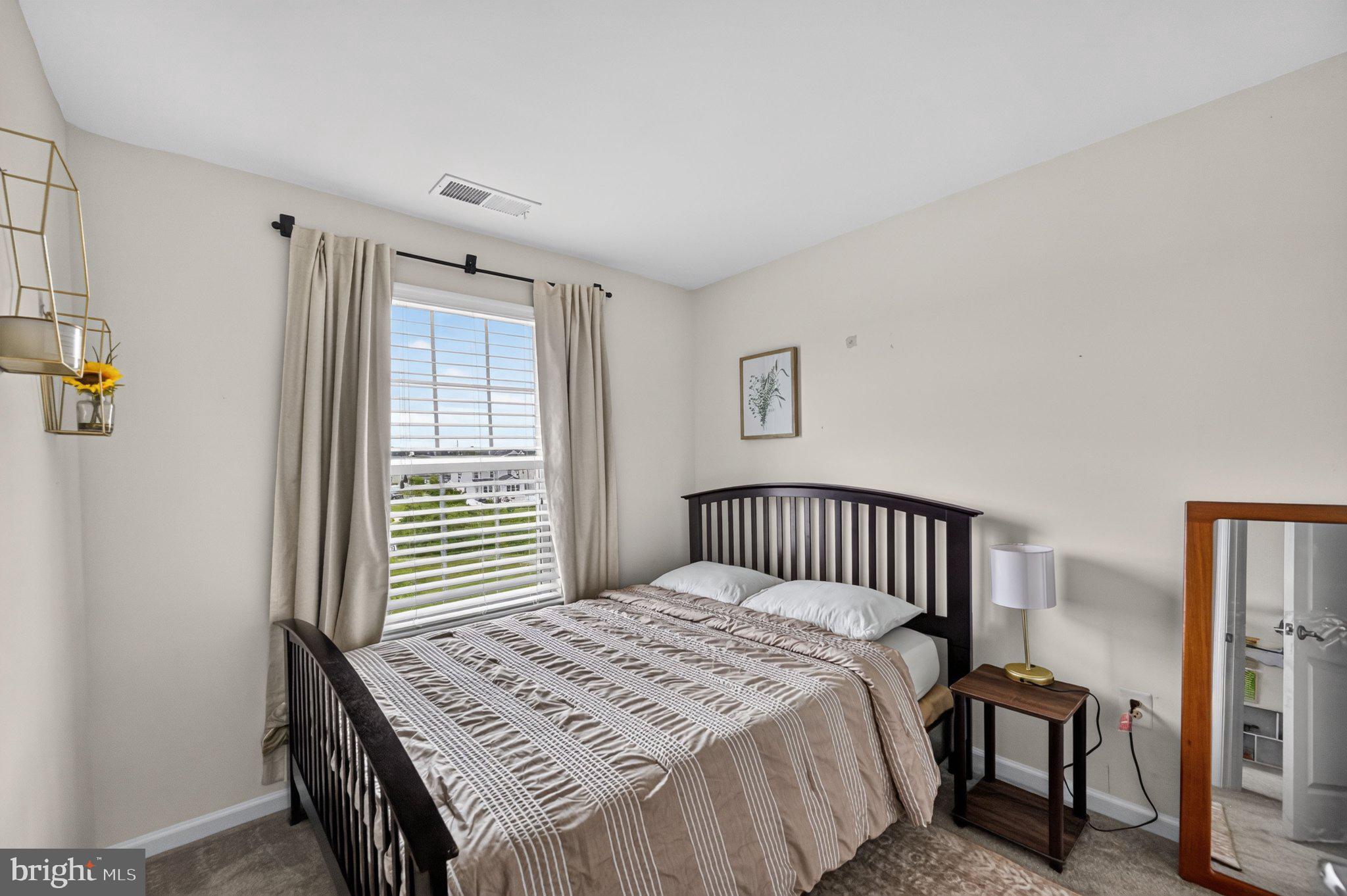 6357 Walcott Lane Frederick, MD 21703 - Photo 17 of 35 Serene bedroom with natural light.